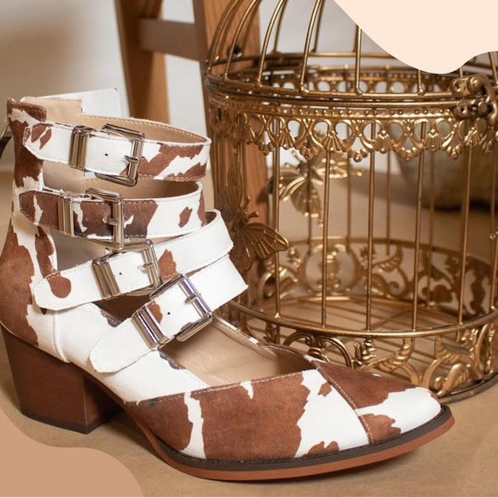 Stylish Cow Print Heeled Boots with Buckles